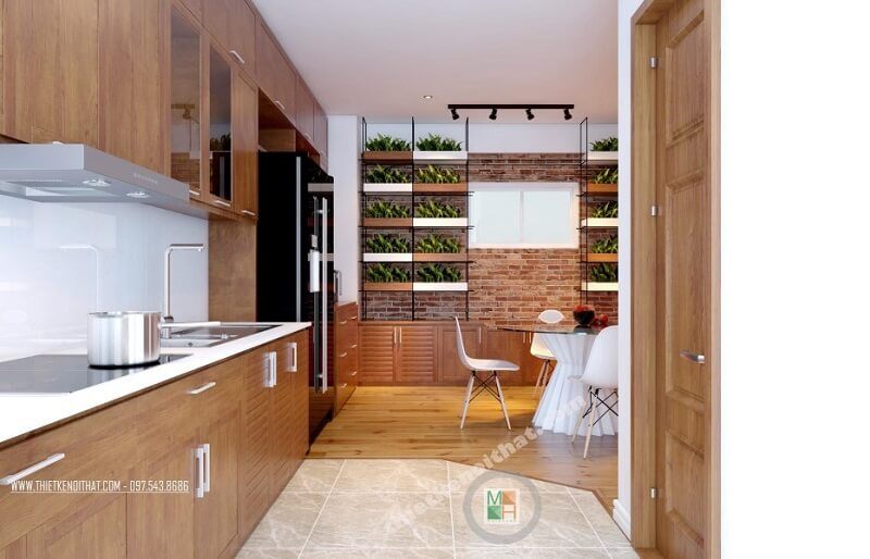 Thiết kế phòng bếp chung cư cao cấp với hệ tủ bếp gỗ tự nhiên cao cấp mang đến không gian nấu ăn lí tưởng cho các chi em nội trợ.