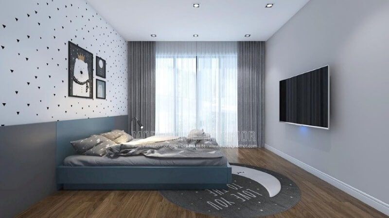 Giấy dán tường phòng bé đơn giản cùng bộ tranh treo tường giúp phòng bé trở nên sinh động, đáng yêu.